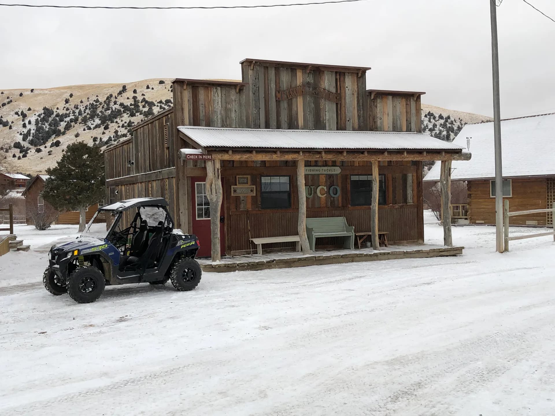 Polaris RZR parked outside the UCO office in the snow