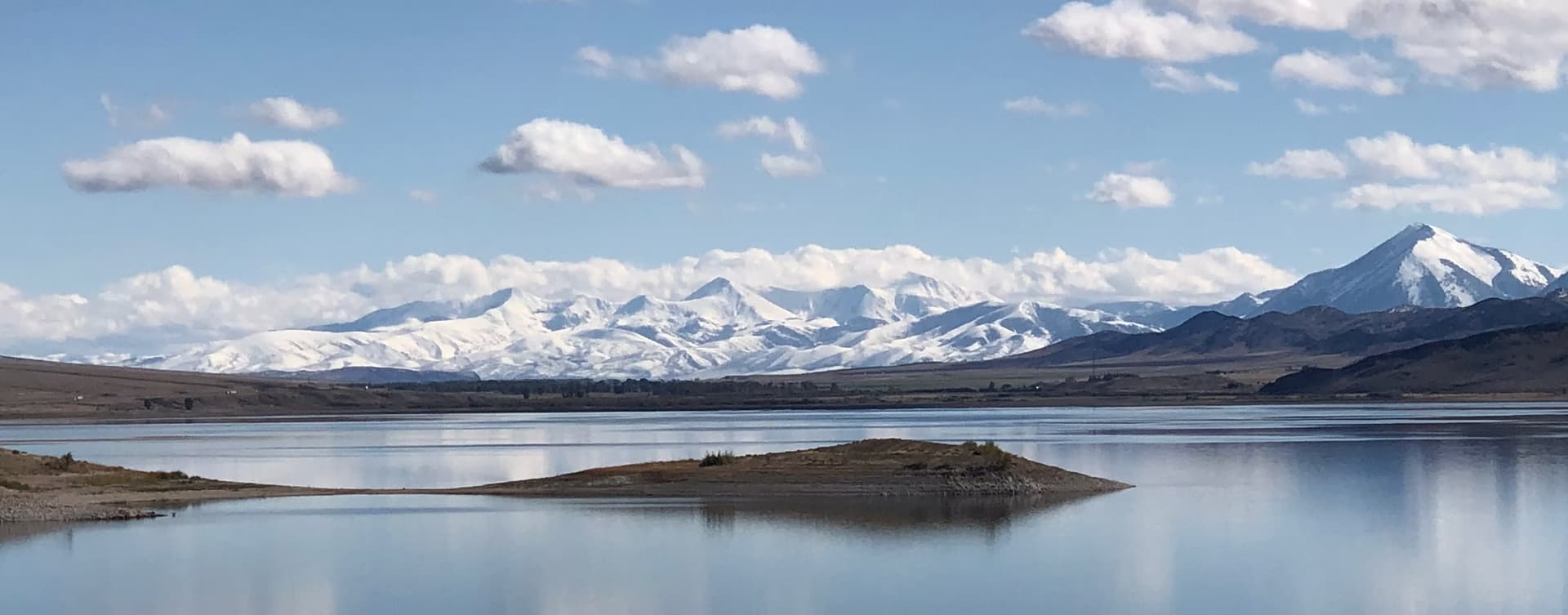 Snowmobiling through Montana wilderness